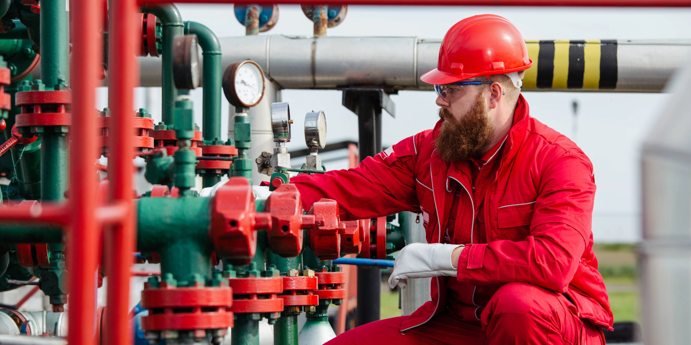 Two service workers using Honeywell Portable Gas Detectors. 